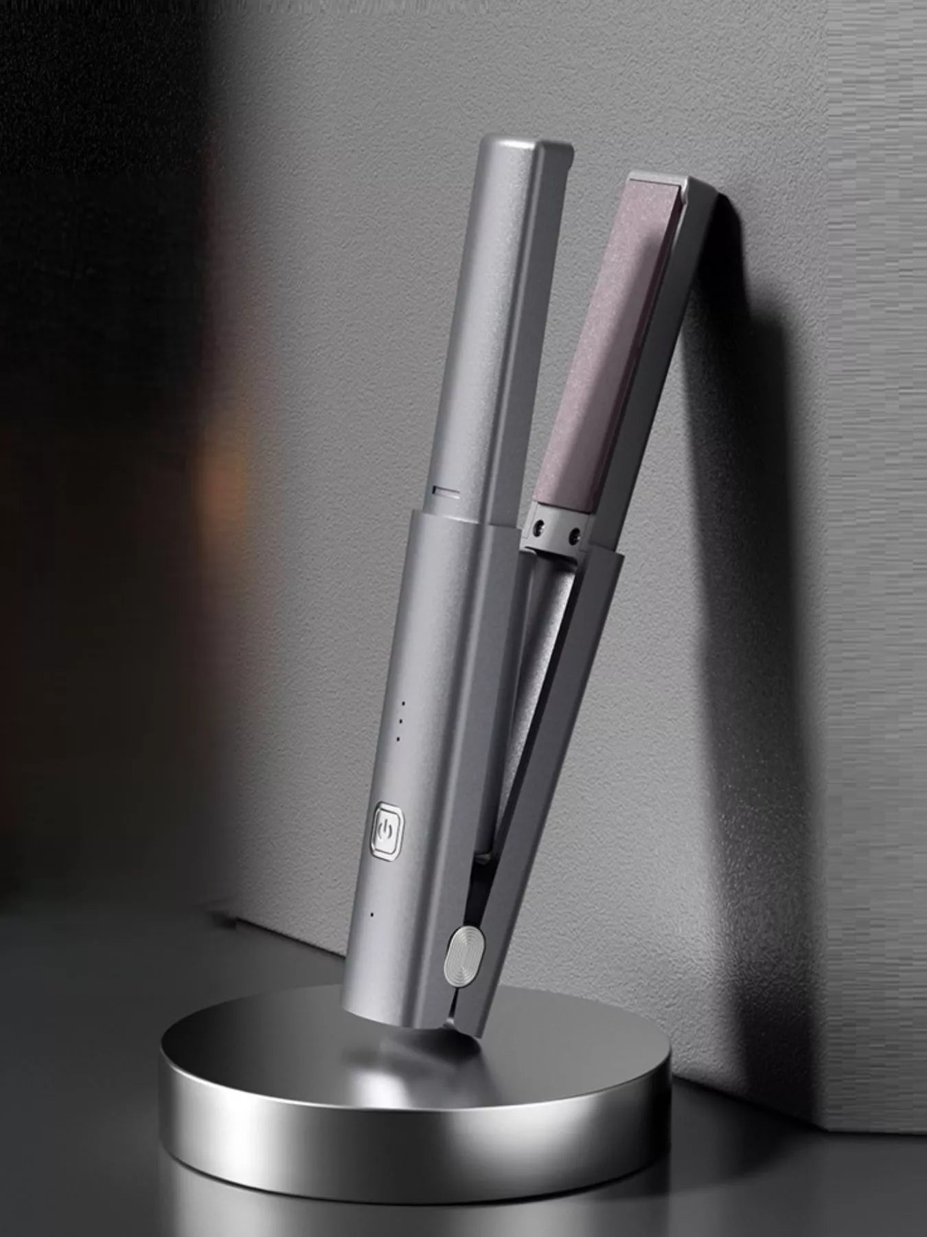 Dark gray portable rechargeable hair straightener by Trendsi, compact design for easy styling on the go.