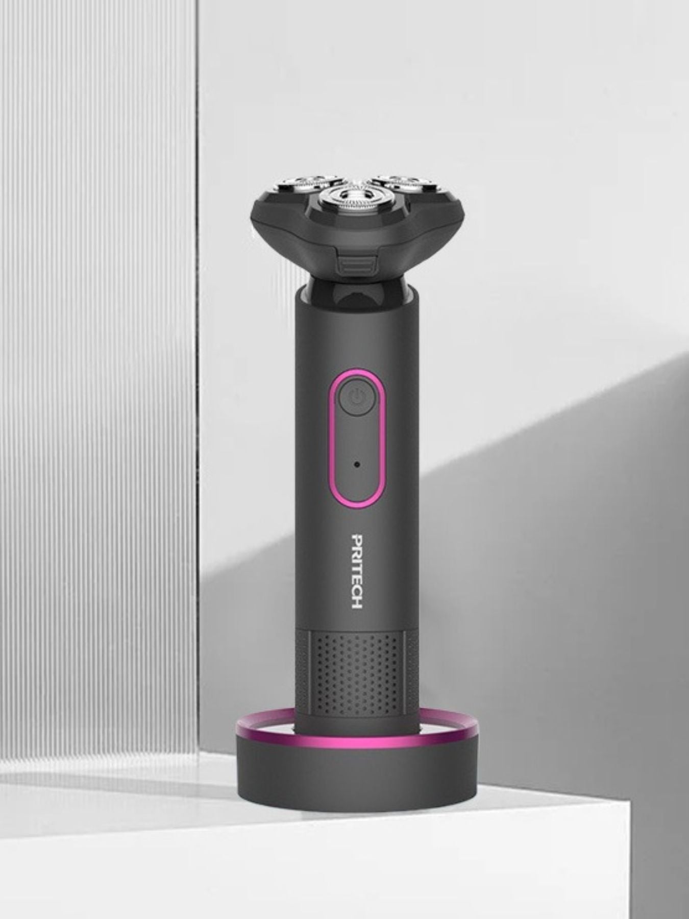 Dark gray rechargeable rotary shaver from Trendsi with a sleek, compact design for easy grooming and facial hair removal.