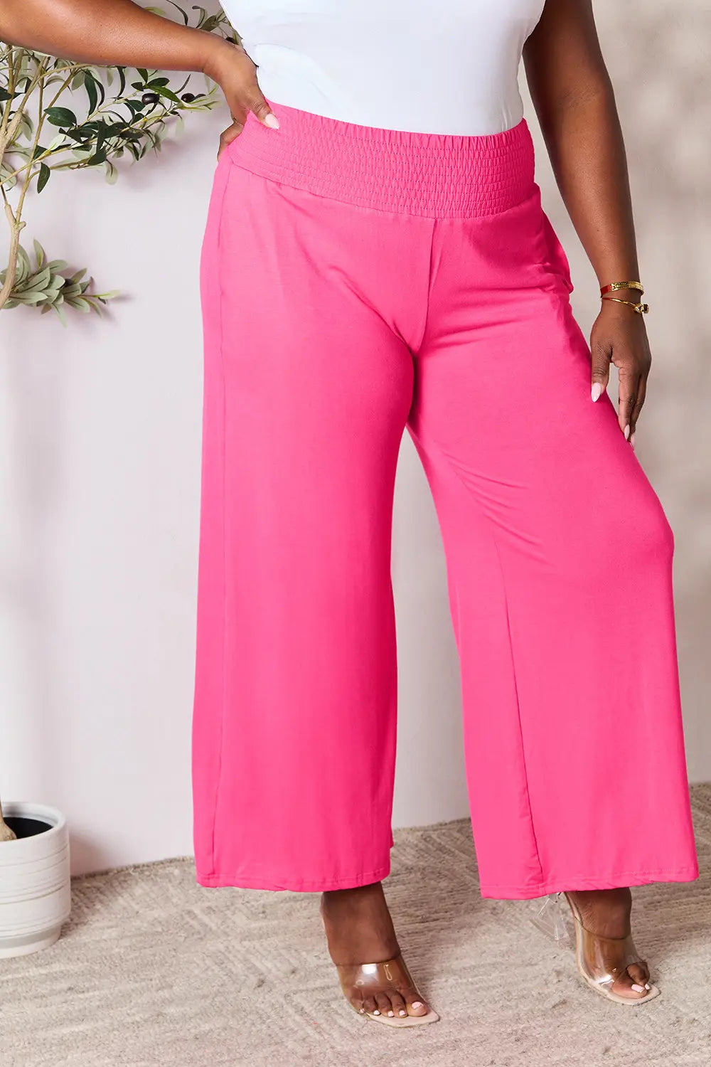 Dark gray Trendsi Basic Bae full-size smocked wide waistband wide-leg pants displayed on a model.