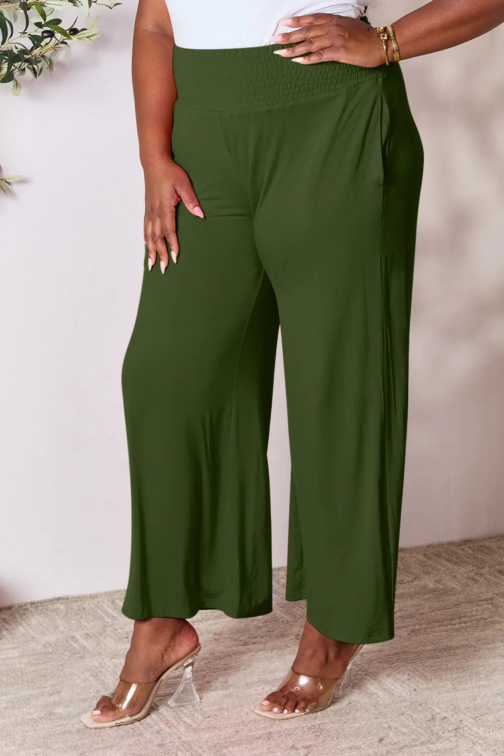 Dark gray Basic Bae full size smocked wide waistband wide-leg pants by Trendsi, featuring a relaxed fit and comfortable style.