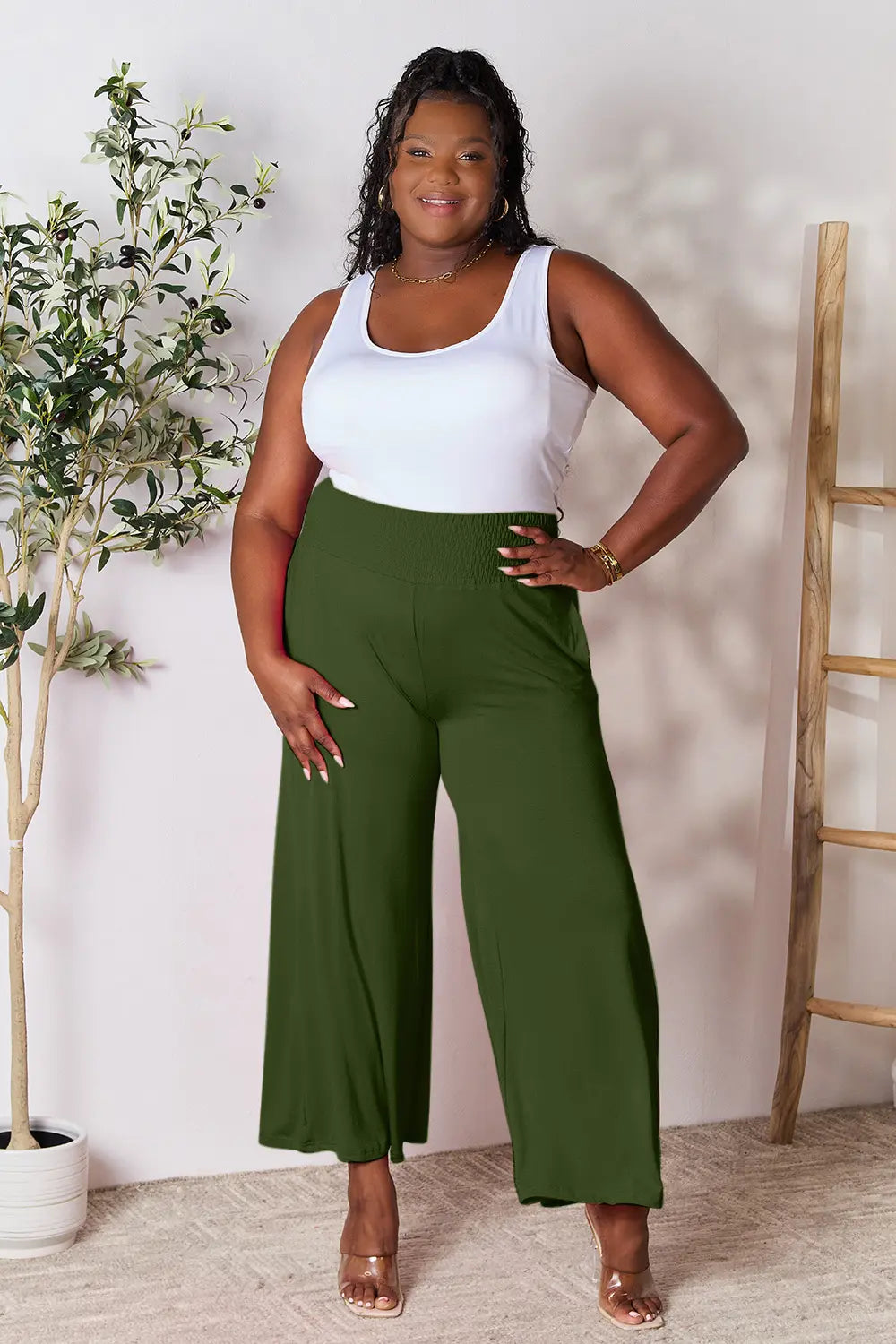 Dark gray Trendsi Basic Bae full-size smocked wide waistband wide-leg pants laid flat on a white background.