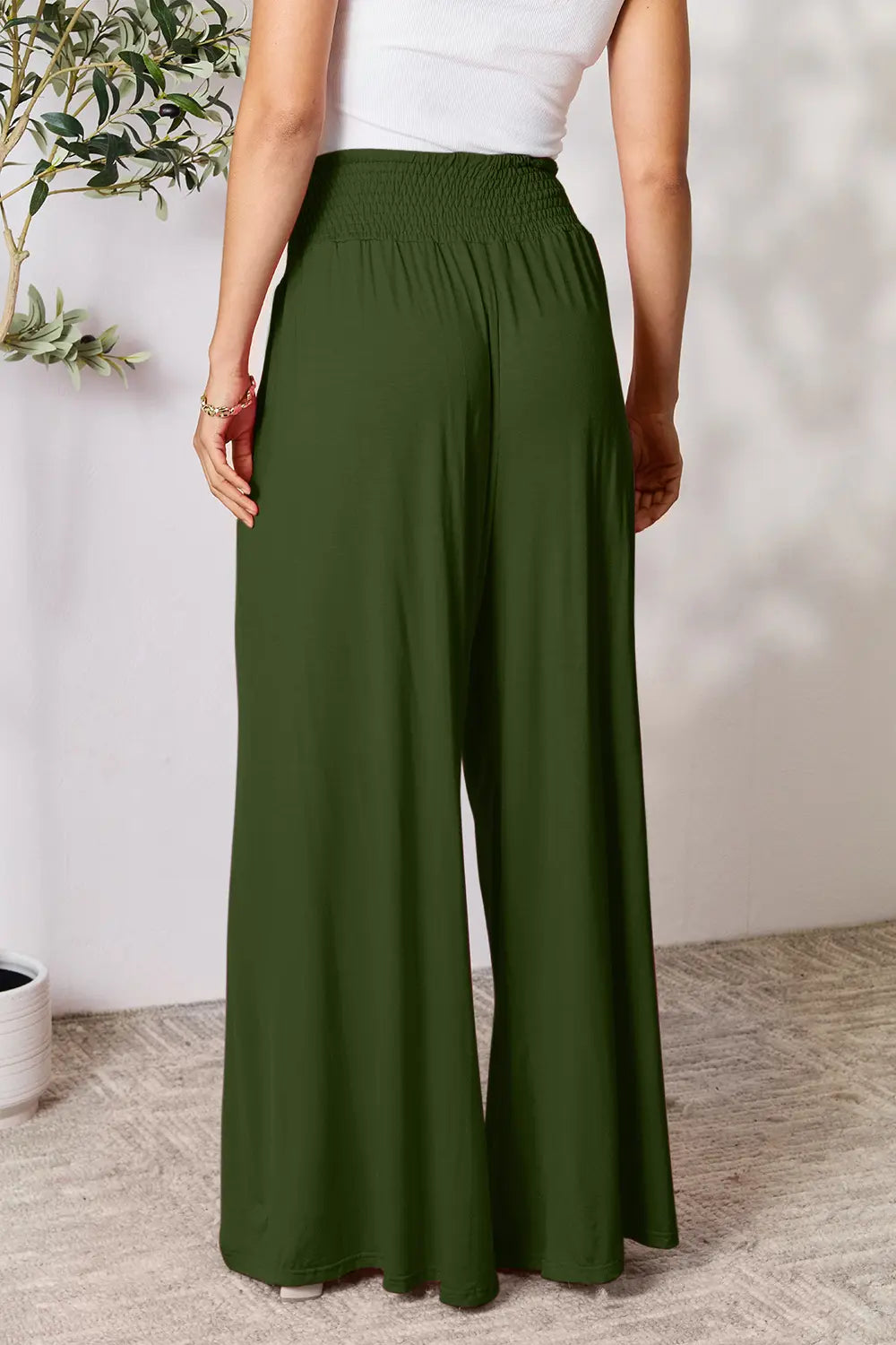 Dark gray Trendsi Basic Bae full-size smocked wide waistband wide-leg pants laid flat on a white background