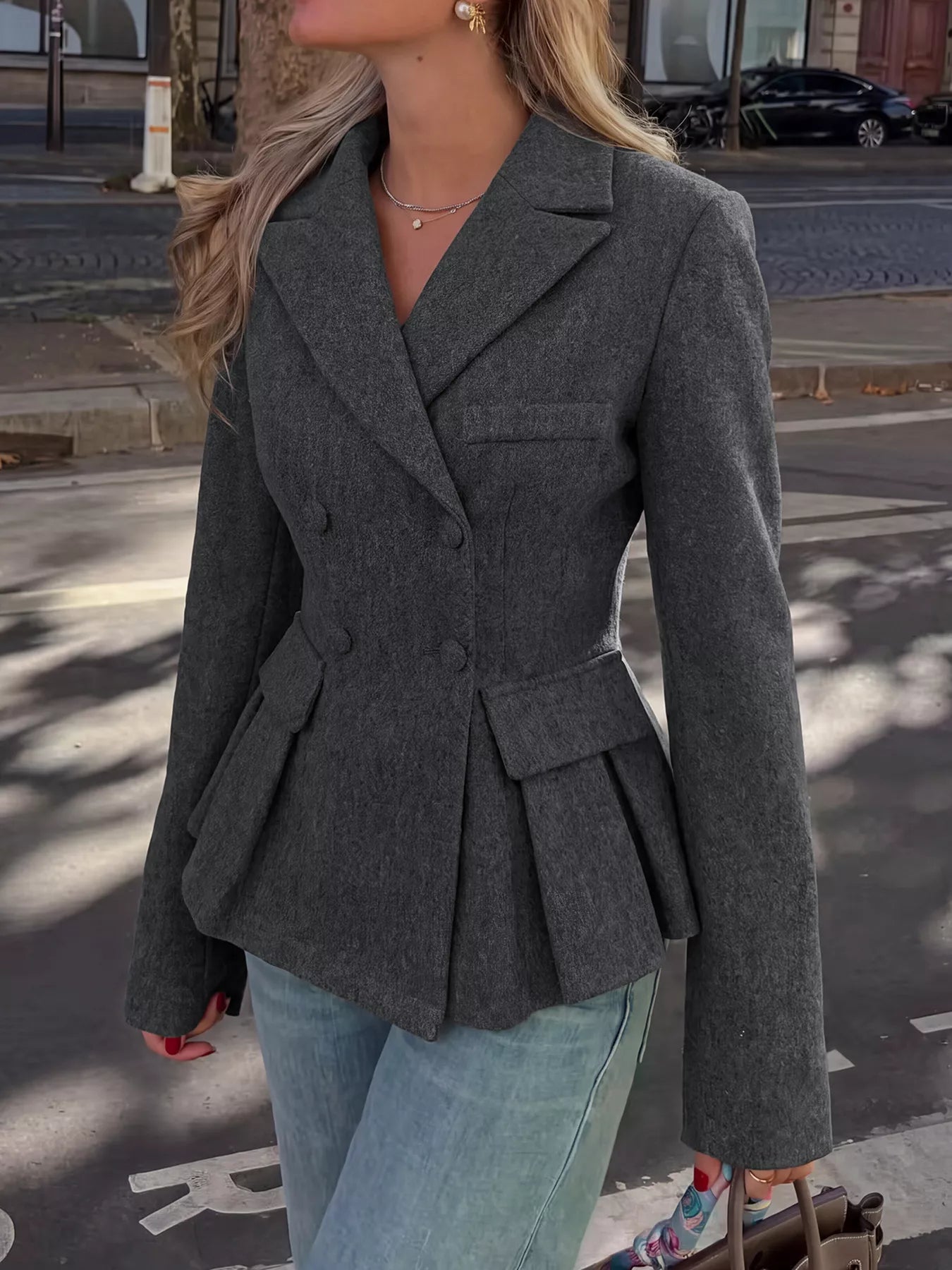 Dark gray double-breasted peplum blazer by Trendsi, featuring structured lapels and tailored fit for a chic, professional look.