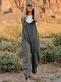 Dark gray Trendsi double take sleeveless V-neck jumpsuit with front pockets, full size, and casual style.