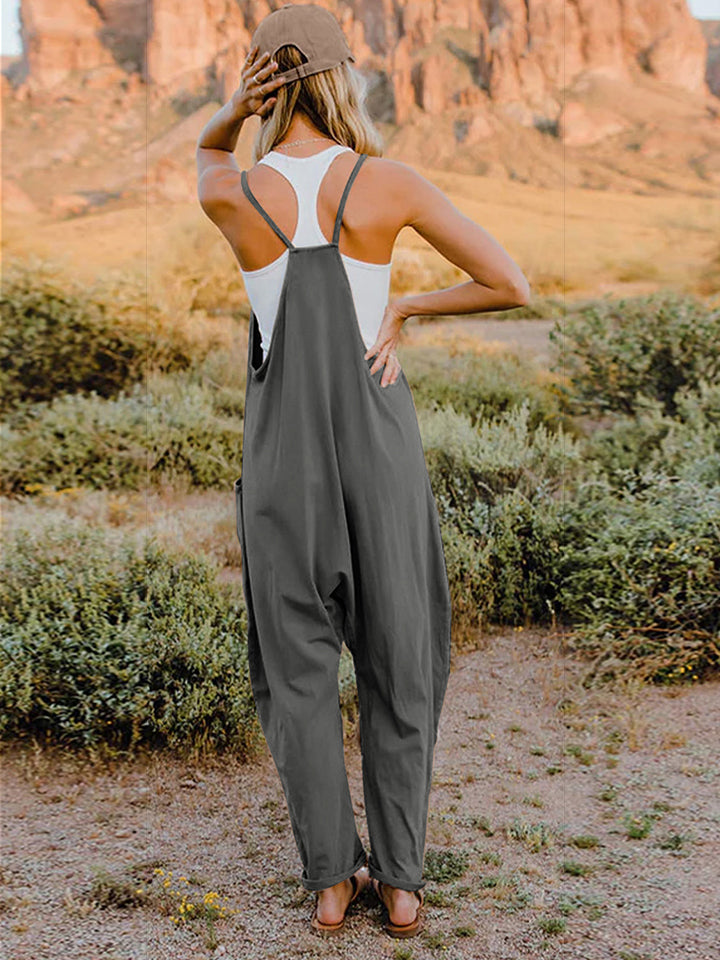 Dark gray Trendsi Double Take sleeveless jumpsuit with V-neck and front pockets, full size, casual and stylish for everyday wear.