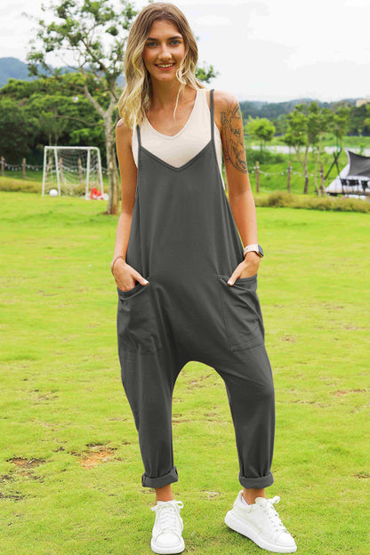Dark gray Trendsi Double Take sleeveless jumpsuit with V-neck and front pockets, full-size and stylish for casual wear.