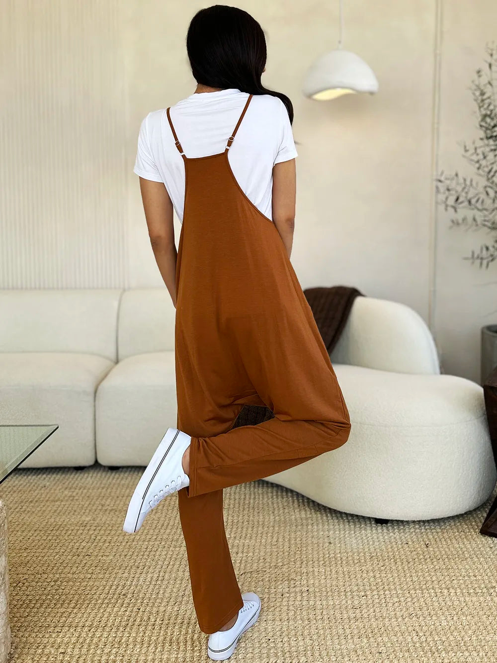 Dark gray Trendsi Double Take sleeveless V-neck jumpsuit with front pockets, full size, stylish and comfortable for casual wear.