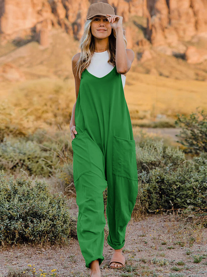 Dark gray Trendsi Double Take sleeveless V-neck jumpsuit with pockets, full size, featuring a stylish and comfortable design.