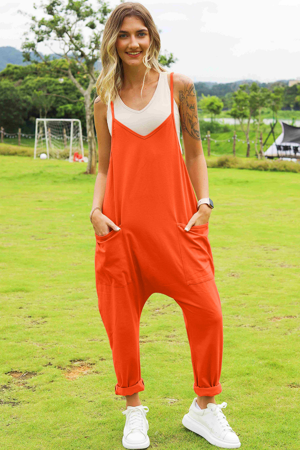 Dark gray Trendsi Double Take sleeveless V-neck jumpsuit with front pockets, full size, stylish and comfortable for casual wear.