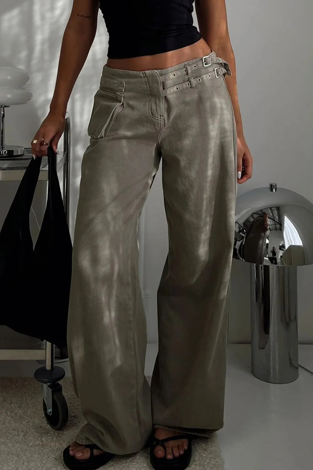 Dark gray wide-leg jeans with pockets from Trendsi, featuring a relaxed fit and classic denim style.