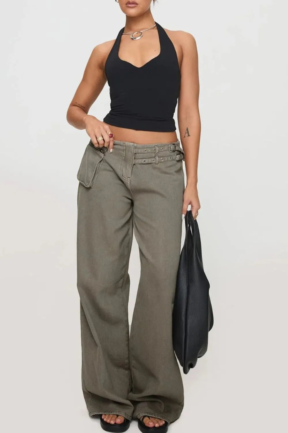 Dark gray wide leg jeans with pockets from Trendsi, featuring a relaxed fit and stylish design.