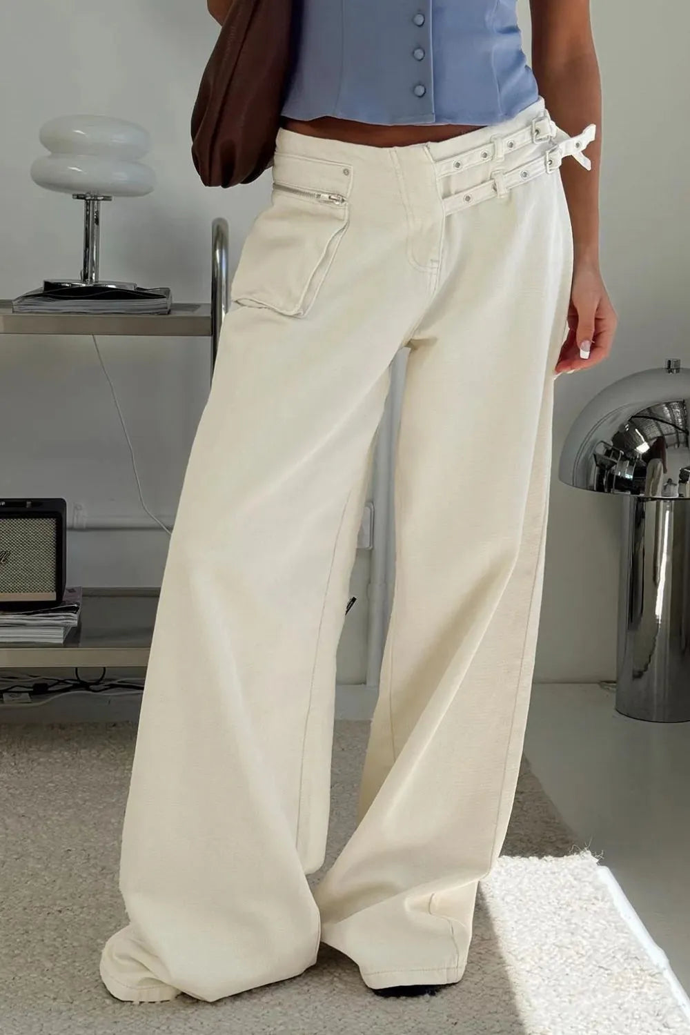 Dark gray wide-leg jeans with pockets from Trendsi, showcasing relaxed fit and casual style.