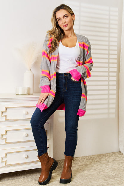 Dark gray woven ribbed long sleeve cardigan by Trendsi, featuring a fitted silhouette and textured knit fabric.