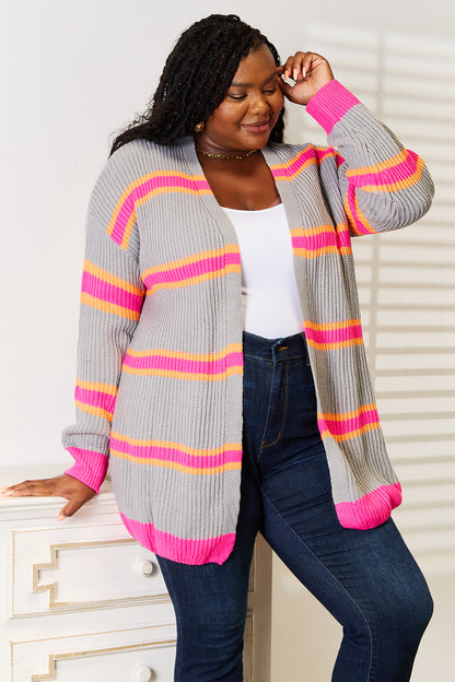Dark gray woven right ribbed long sleeve cardigan by Trendsi, featuring a textured knit and fitted ribbed cuffs.