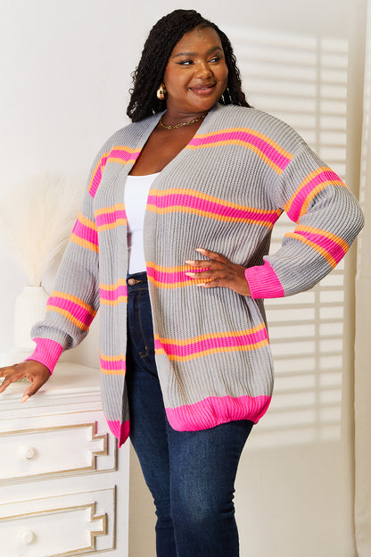 Dark gray woven right ribbed long sleeve cardigan from Trendsi, featuring a fitted design and textured knit fabric.