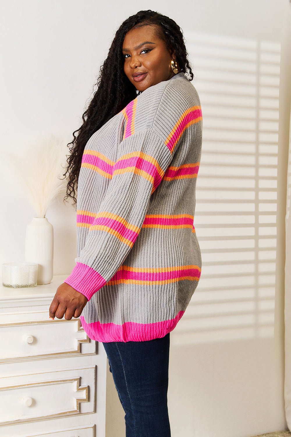 Dark gray woven ribbed long sleeve cardigan from Trendsi, featuring a right ribbed pattern and a cozy, stylish fit.