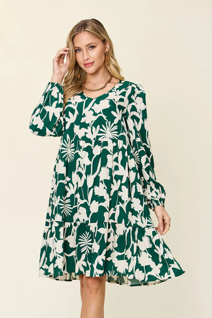 Dark green Trendsi Double Take full-size printed ruffle hem dress with pocket, showcasing a stylish design and feminine details.