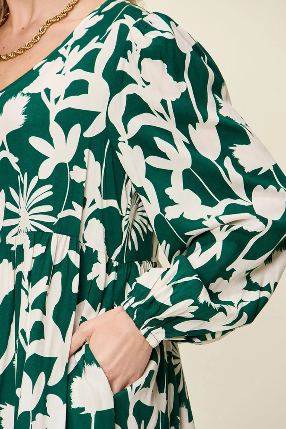 Dark green Trendsi Double Take full-size printed ruffle hem dress with pocket, showcasing stylish design and feminine details.