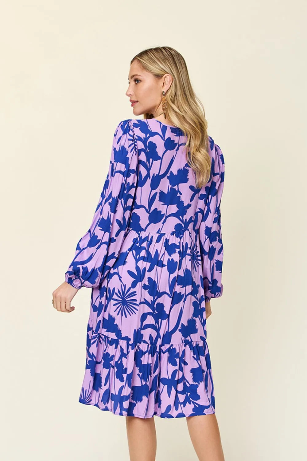 Dark green Trendsi Double Take full-size printed ruffle hem dress with pockets, featuring a stylish design and flowy silhouette.