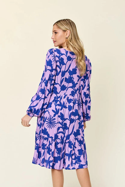 Dark green Trendsi Double Take full-size printed ruffle hem dress with pockets, featuring a stylish design and flowy silhouette.