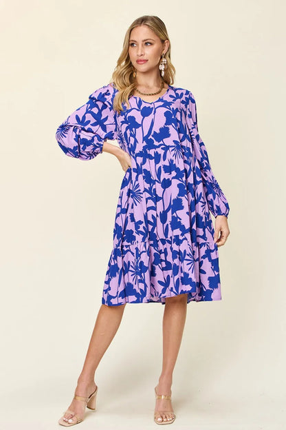 Dark green Trendsi Double Take full-size printed dress with ruffle hem and pocket, featuring a stylish, flowy design.