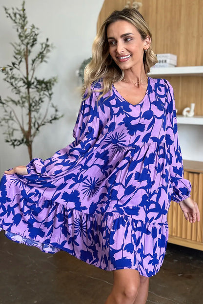 Dark green Trendsi Double Take printed ruffle hem dress with pockets, full size, featuring a stylish ruffle detail and comfortable fit.