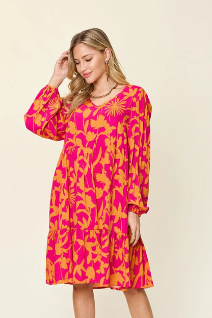 Dark green Trendsi Double Take full-size printed ruffle hem dress with pocket, showcasing its flowy design and stylish details.