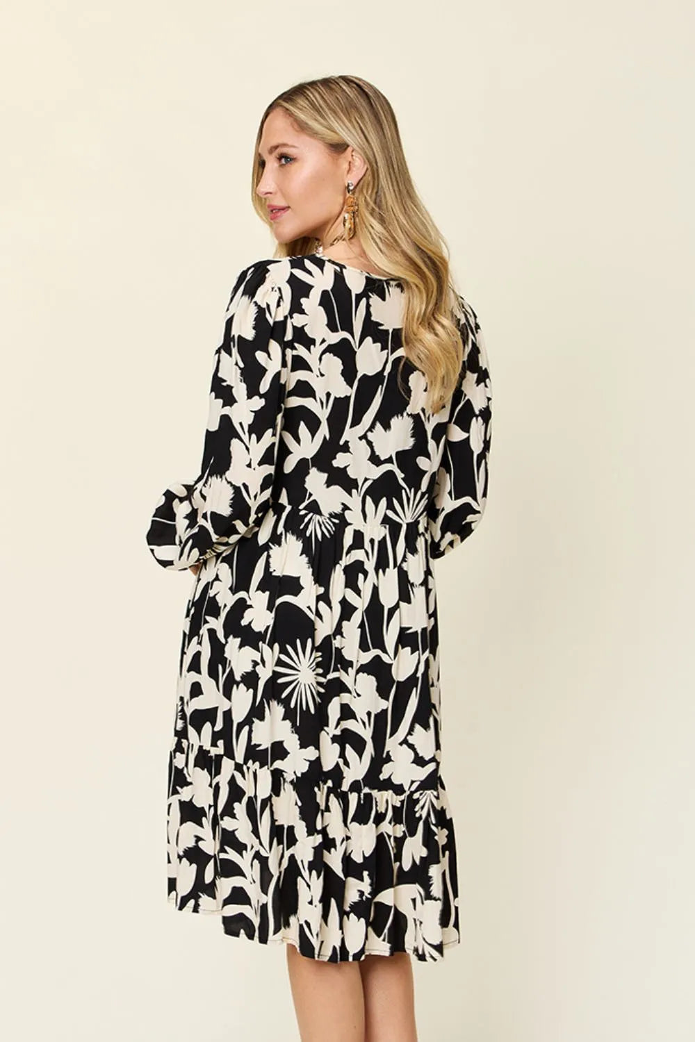 Dark green Trendsi Double Take full-size printed ruffle hem dress with pockets, featuring a stylish design and comfortable fit.