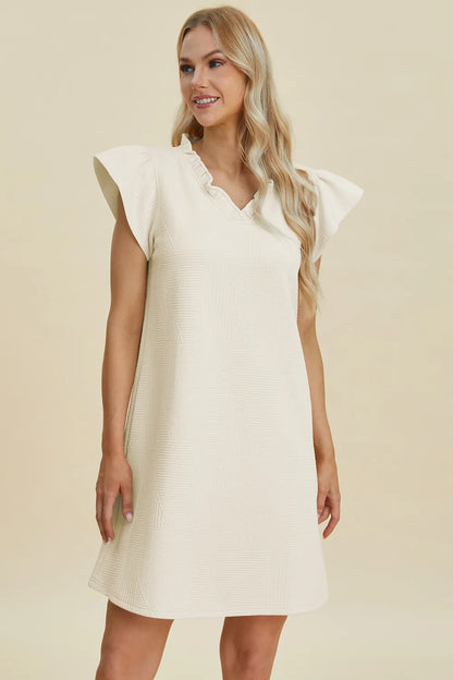 Dark green Trendsi Double Take full-size ruffled V-neck cap sleeve dress displayed on a model.