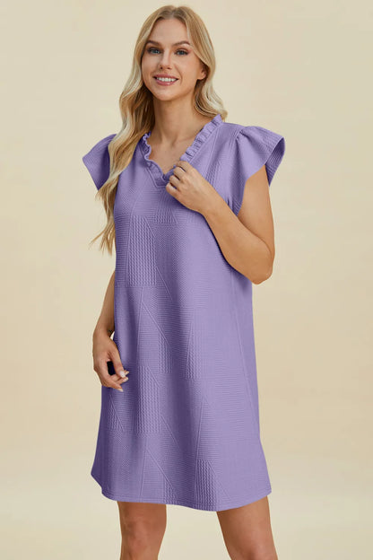 Dark green double take full-size ruffled v-neck cap sleeve dress by Trendsi, shown on model with ruffled details and a flattering fit.