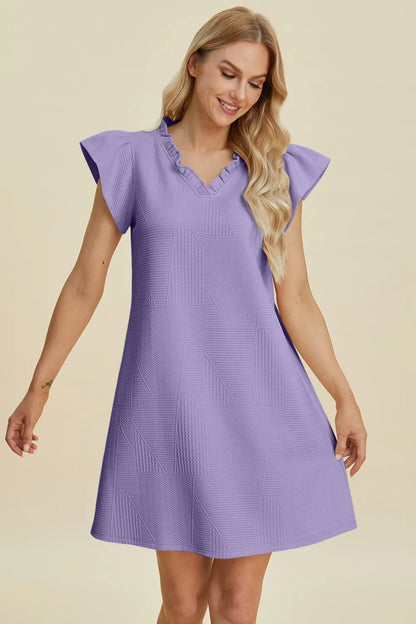 Dark green double take full-size ruffled V-neck cap sleeve dress by Trendsi, featuring a flattering V-neck and ruffled details.