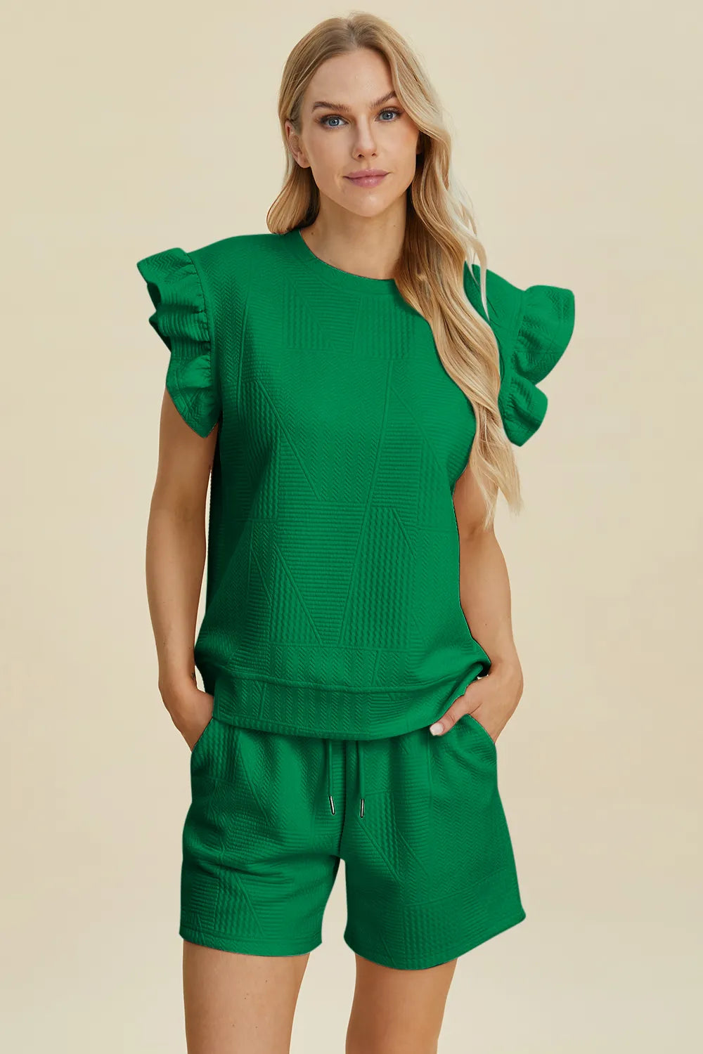 Dark green Trendsi Double Take full-size textured round neck ruffle sleeve top and matching shorts set, styled for casual wear.