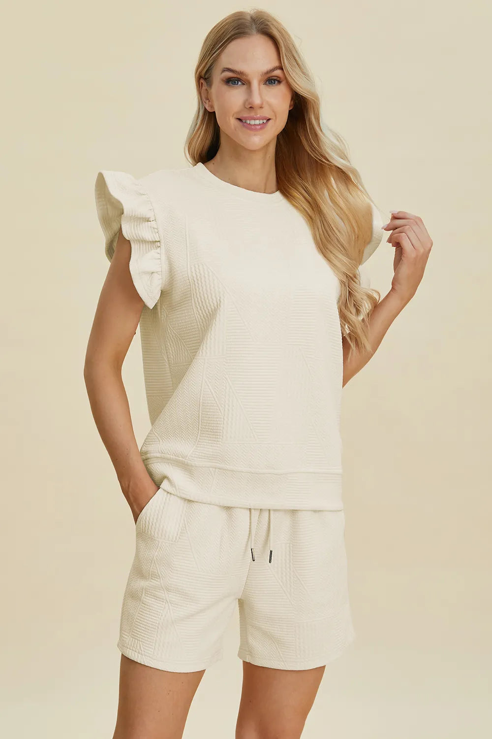 Dark green Trendsi double take full-size textured round neck top with ruffle sleeve, paired with matching shorts set.