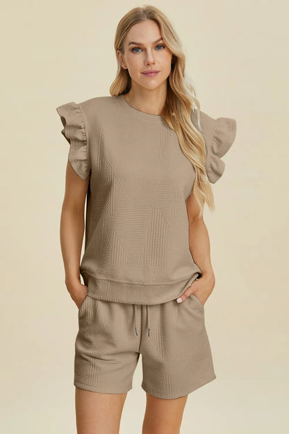Dark green Trendsi double take texture round neck ruffle sleeve top and matching shorts set, casual and stylish for warm weather.