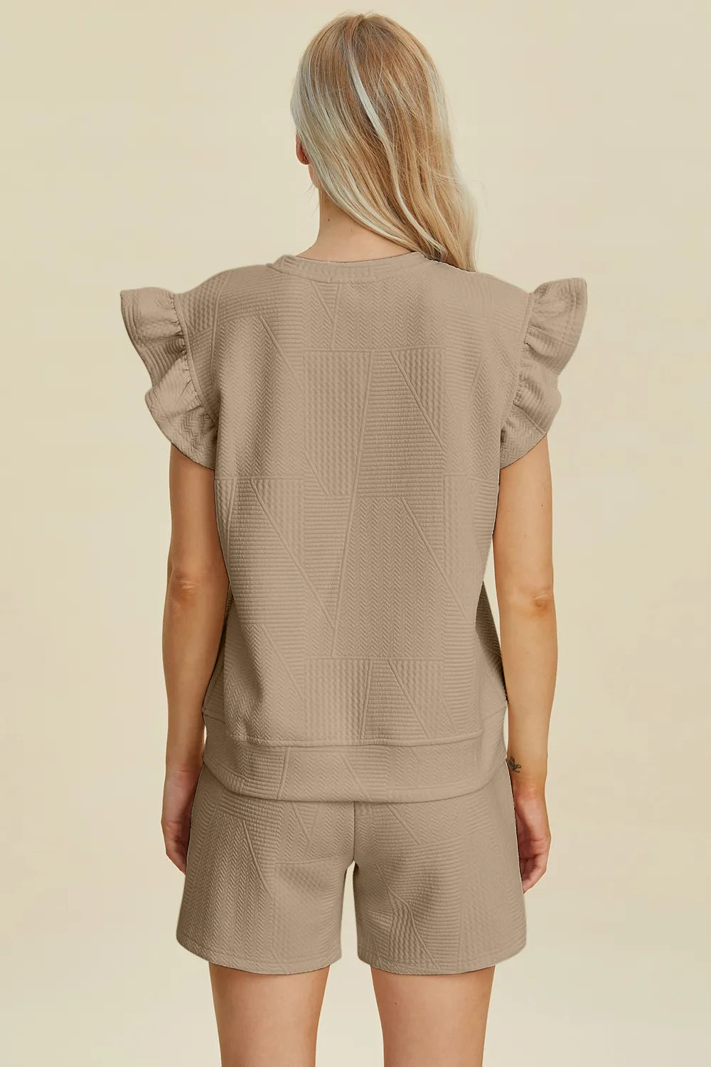 Dark green Trendsi double take full-size textured round neck top with ruffle sleeves and matching shorts set on a model.