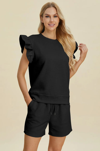 Dark green Trendsi double take full-size textured round neck top with ruffle sleeves and matching shorts set, casual and stylish.