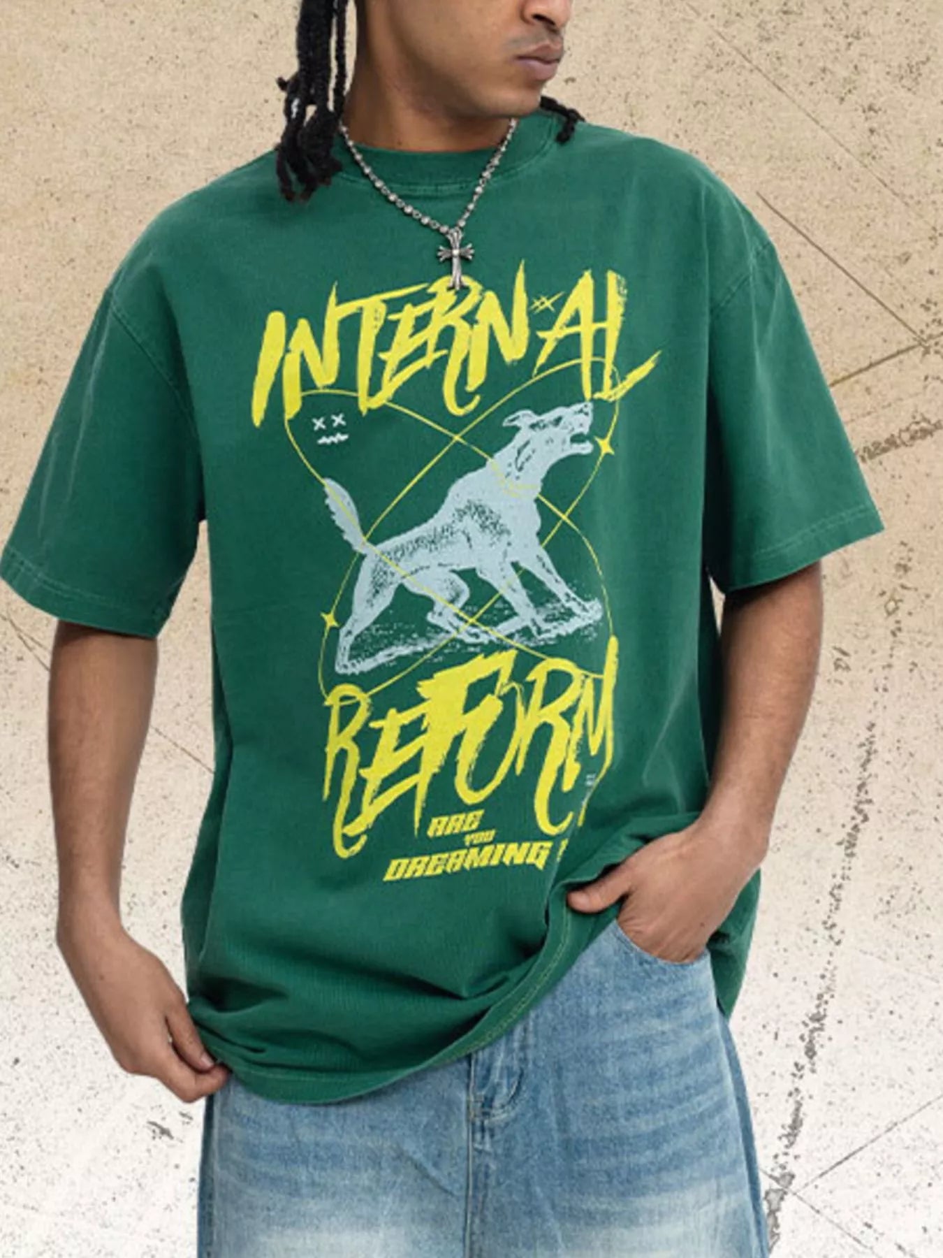 Dark green men's oversized graphic short sleeve T-shirt from Trendsi, featuring bold design on soft, comfortable fabric.