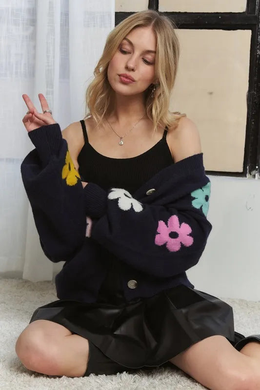 Dark navy ADORA Flower Button Down Lantern Sleeve Cardigan by Trendsi, featuring floral design and relaxed fit.