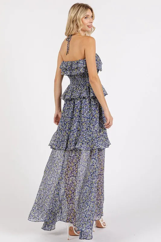 Dark navy Mittoshop floral halter neck maxi dress with ruffled smocked bodice and flowy skirt, perfect for summer or special occasions.