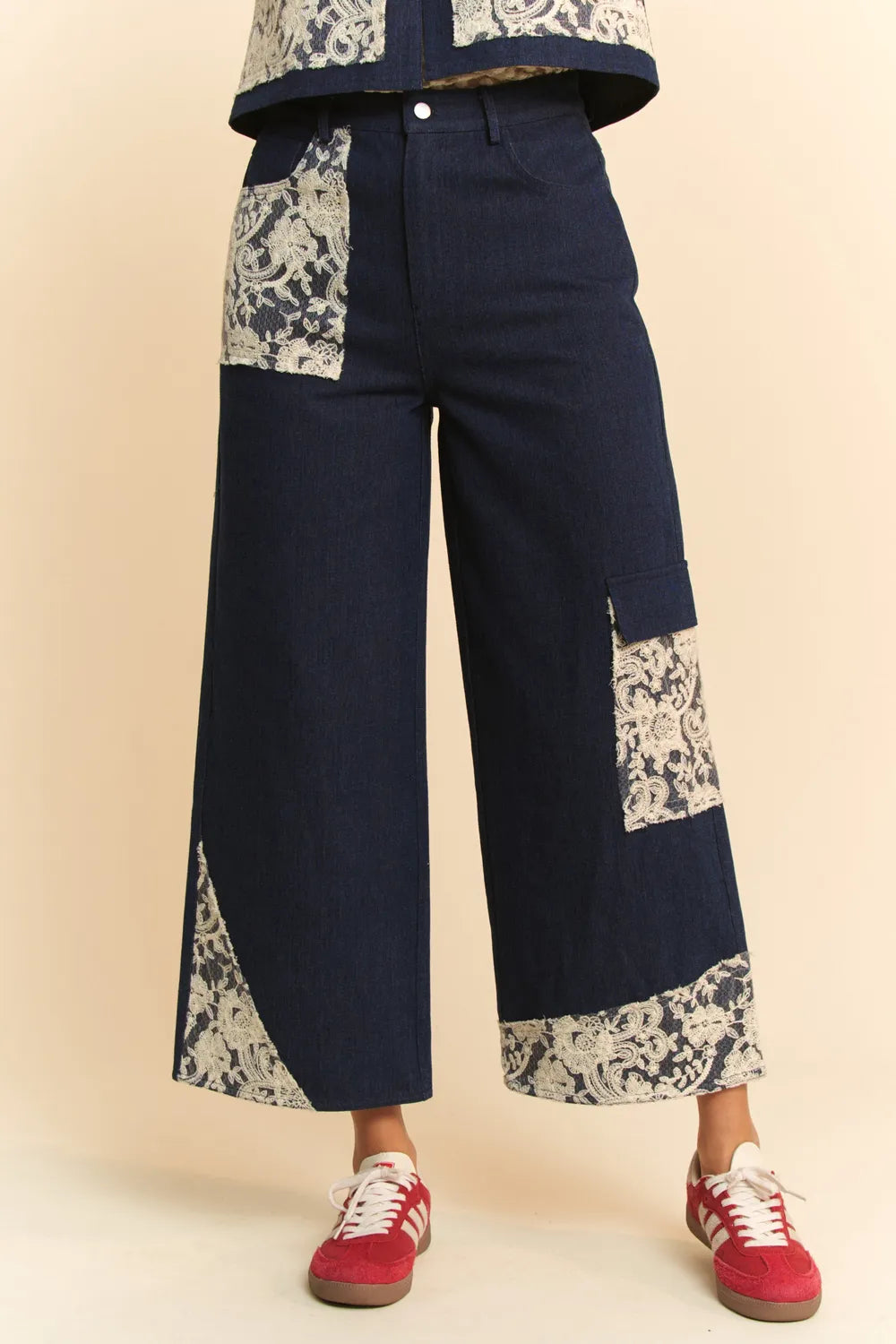 Dark wash Davi & Dani lace applique wide leg jeans from Trendsi, featuring lace details and a relaxed fit.