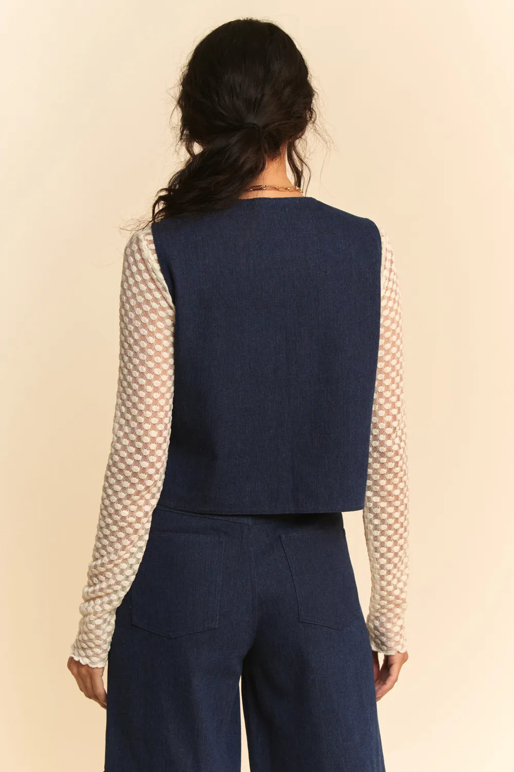 Dark denim Davi & Dani lace patch open front vest with distressed details, stylish and casual for layered outfits.