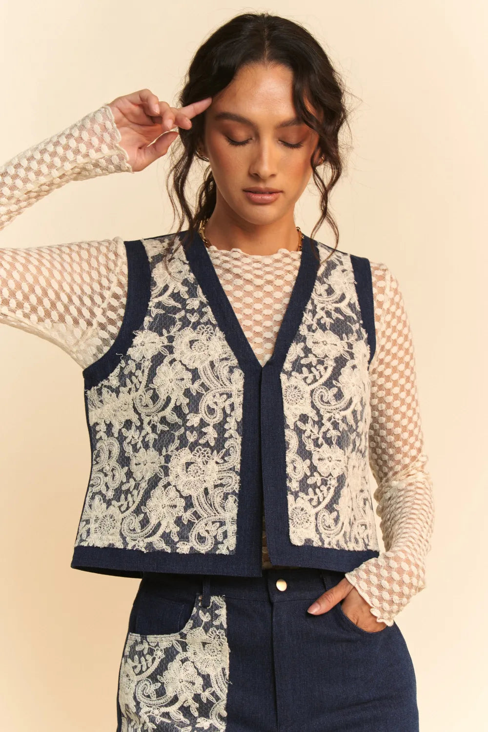 Dark denim open front vest with lace patch details from Davi & Dani, featuring a stylish, casual design.