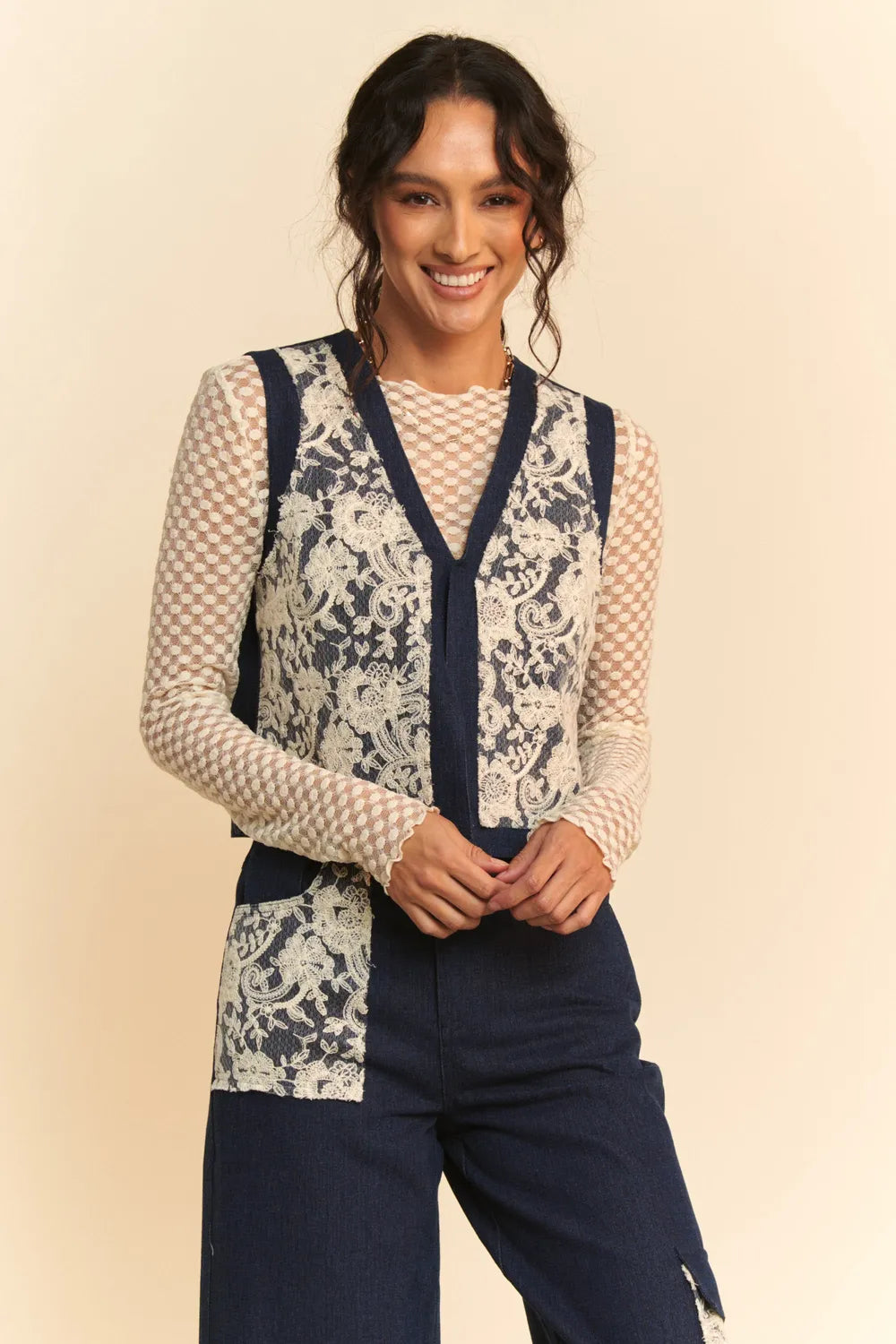 Dark denim open front vest with lace patches by Davi & Dani, featuring a trendy, casual style and front pockets.