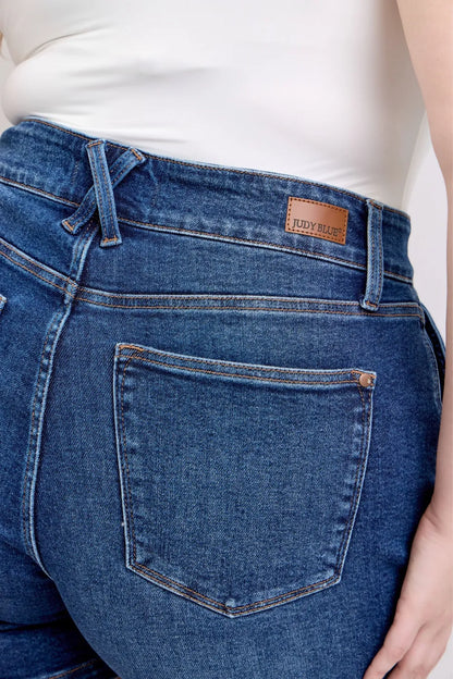 Plus size Judy Blue denim shorts with double button waistband, dark wash, and stylish fit, perfect for casual summer wear.