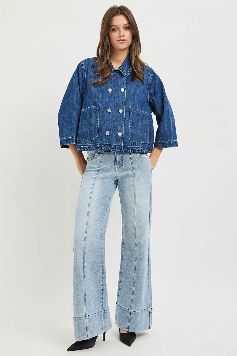 Dark blue RISEN double-breasted flowy cropped denim jacket by Trendsi with long sleeves and classic collar detail.