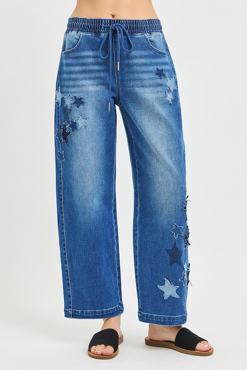 Dark gray Risen elastic band slouchy cropped barrel pants with star patch from Trendsi, showcasing relaxed fit and stylish patch detail.