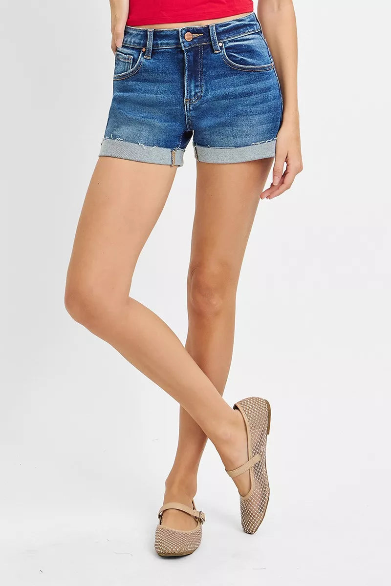Dark gray RISEN low-rise cuffed shorts by Trendsi, with rolled hems and casual fit, shown on a model.