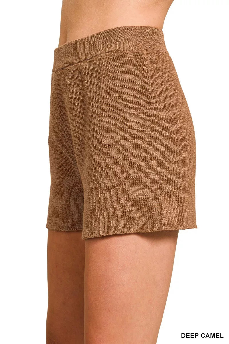 Deep camel Zenana knit top and shorts sweater set with round neck, casual and comfortable for everyday wear.