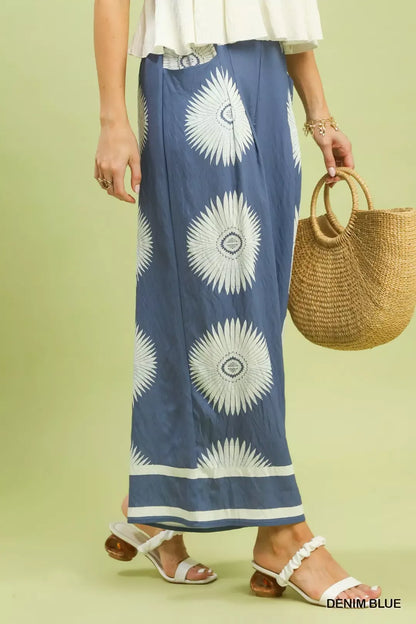 Blue wide-leg pants with abstract border print by Umgee, featuring a relaxed fit and stylish design.