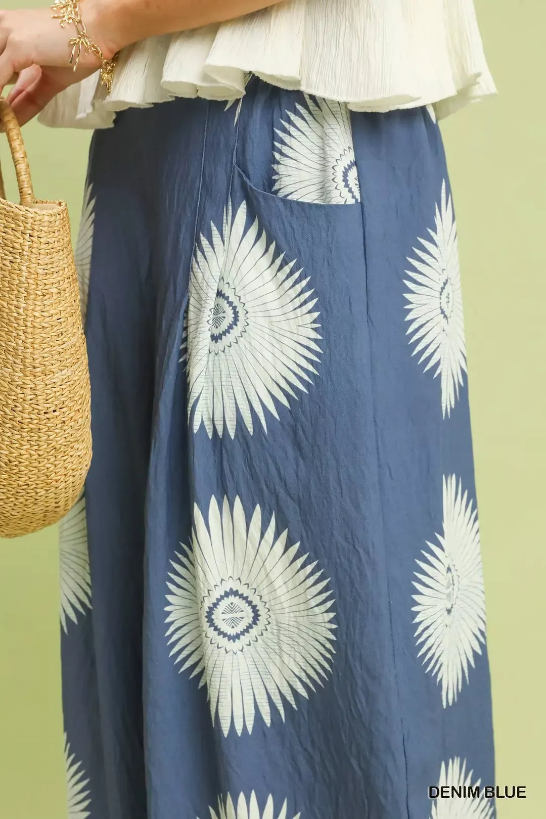 Trendsi Umgee denim blue abstract border print wide-leg pants with relaxed fit and flowing silhouette.